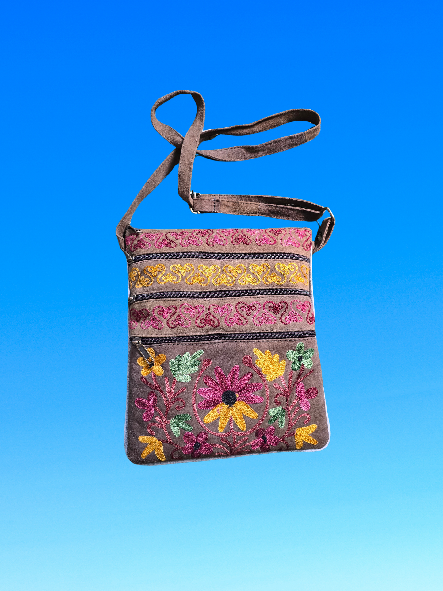 Sac à bandoulière en toile brodée de motifs floraux