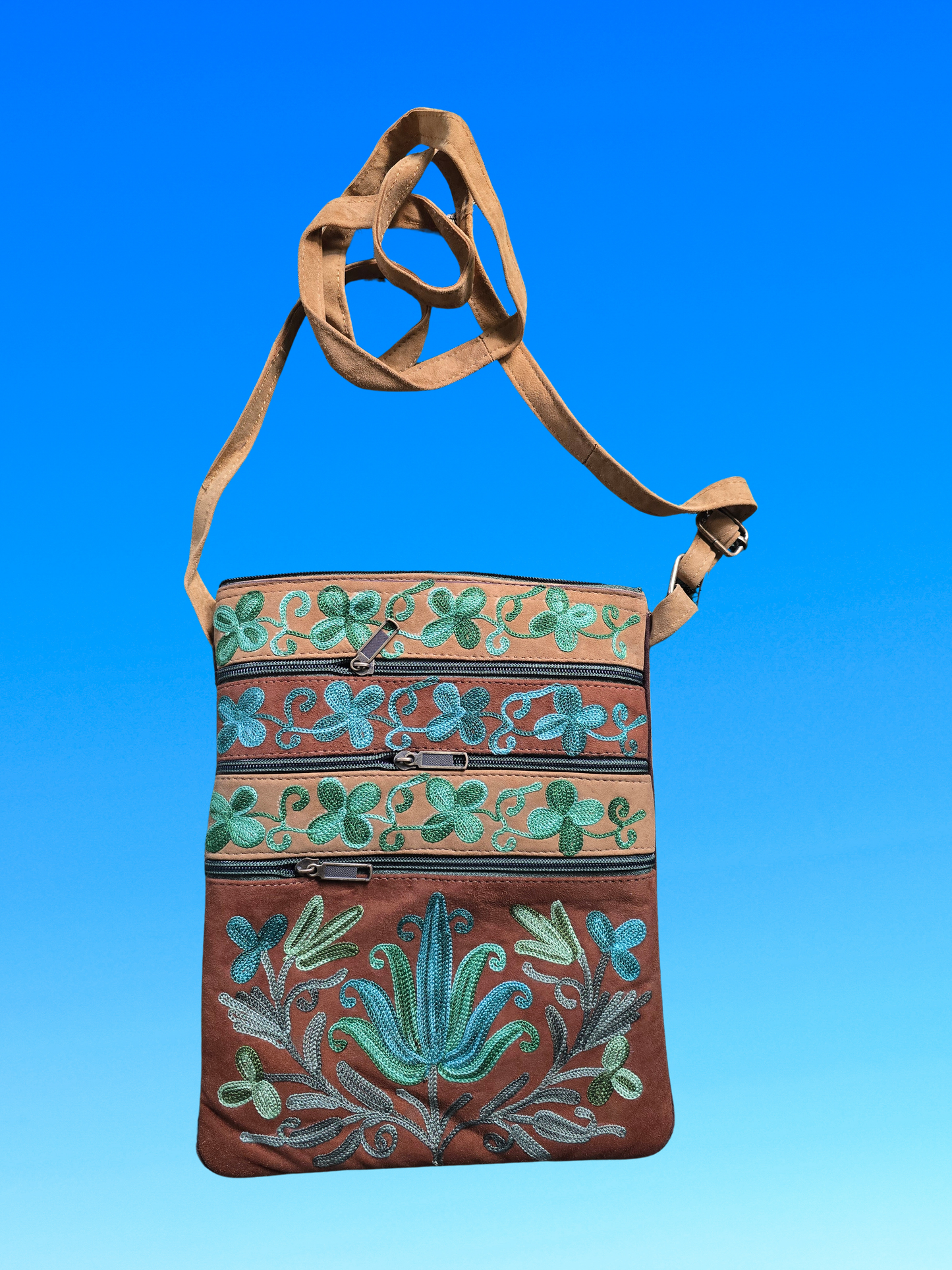Sac à bandoulière en toile brodée de motifs floraux